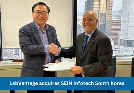 Michel Gerlicher, President of LabVantage International (R),and Jung Moon Lee, CEO of SEIN Infotech (L), seal the acquisition with a handshake.